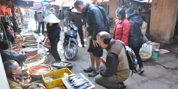Visit the local market to pick some ingredients for lunch, Vietnam Cozy Travel, Vietnam Tours